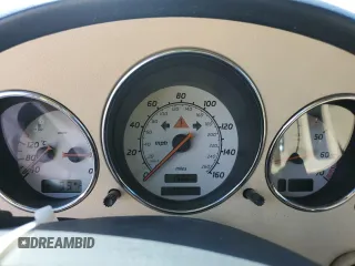 2003 Mercedes-Benz SLK 320 with VIN WDBKK65F03F286130, listed as a Copart auction lot 61544385 with 98,899 mi miles and Salvage title. Bid and sale history available at DreamBid. Image 9.