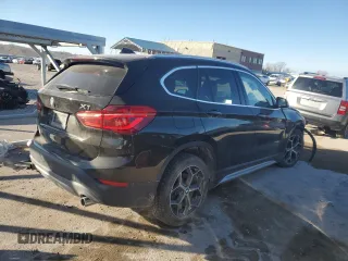 2016 BMW X1 xDrive28i with VIN WBXHT3C36GP880207, listed as a Copart auction lot 82597924 with 145,444 mi miles and Salvage Title. Bid and sale history available at carsss.com. Image 3.