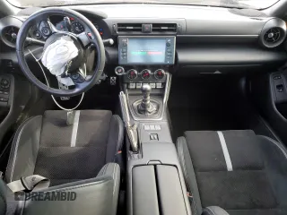 2022 Toyota GR86 Premium with VIN JF1ZNBE19N9750723, listed as a Copart auction lot 83248234 with 21,607 mi miles and Salvage Title. Bid and sale history available at carsss.com. Image 8.