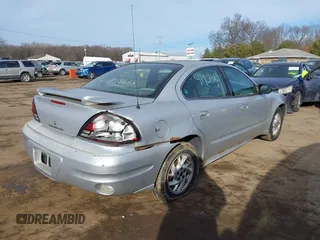 2004 Pontiac Grand Am SE1 with VIN 1G2NF52E24C239133, listed as a IAAI auction lot 41458613 with 149,815 mi miles and . Bid and sale history available at DreamBid. Image 6.