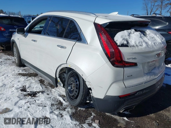 2022 Cadillac XT4 AWD Premium Luxury with VIN 1GYFZDR4XNF139337, listed as a IAAI auction lot 41326816 with 26,823 mi miles and . Bid and sale history available at carsss.com. Image 3.