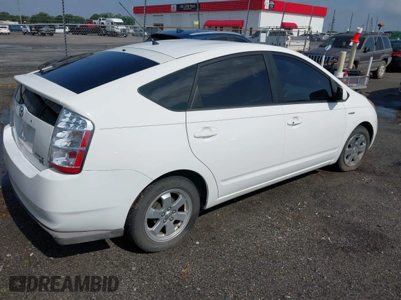 2008 Toyota Prius with VIN JTDKB20UX83395915, listed as a IAAI auction lot 42522466 with 241,441 mi miles and . Bid and sale history available at DreamBid. Image 4.
