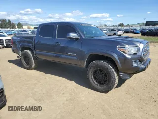 2017 Toyota Tacoma SR5 with VIN 3TMAZ5CNXHM032218, listed as a Copart auction lot 49672275 with 104,244 mi miles and Salvage Title. Bid and sale history available at DreamBid. Image 4.