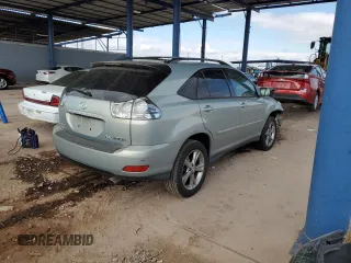 2007 Lexus RX 400h z VIN JTJGW31U972001465, wystawiony jako Copart lot #42049045 z przebiegiem 75 325 mil mil oraz Szkody całkowita. Historia ofert i sprzedaży dostępna na DreamBid. Obrazek 3.