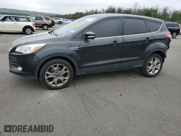 2013 Ford Escape SEL with VIN 1FMCU9H92DUA86916, listed as a Copart auction lot 63516415 with 167,791 mi miles and Salvage title. Bid and sale history available at DreamBid. Image 1.