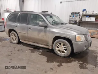 2008 GMC Envoy Denali with VIN 1GKET63M682203980, listed as a IAAI auction lot 41106438 with 140,914 mi miles. Bid and sale history available at carsss.com. Image 1.