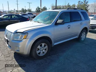 2011 Mercury Mariner z VIN 4M2CN8B70BKJ04853, wystawiony jako IAAI lot #41345383 z przebiegiem 259 727 mil mil oraz . Historia ofert i sprzedaży dostępna na DreamBid. Obrazek 2.