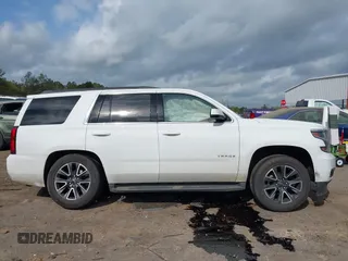 2017 Chevrolet Tahoe LS with VIN 1GNSCAKC5HR312729, listed as a IAAI auction lot 41928484 with 206,999 mi miles and . Bid and sale history available at DreamBid. Image 13.