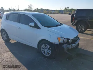 2014 Chevrolet Sonic LT with VIN 1G1JC6SH8E4130375, listed as a IAAI auction lot 41672713 with 167,012 mi miles. Bid and sale history available at carsss.com. Image 1.