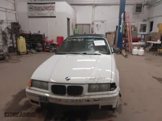 1997 BMW 3-Series 328IC with VIN WBABK832XVET95942, listed as a IAAI auction lot 41246303 with 165,825 mi miles. Bid and sale history available at carsss.com. Image 12.