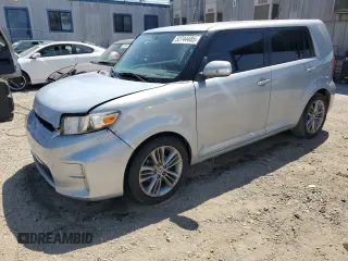 2013 Scion xB with VIN JTLZE4FE5DJ039321, listed as a Copart auction lot 52744485 with 128,536 mi miles and Salvage Title. Bid and sale history available at carsss.com. Image 1.