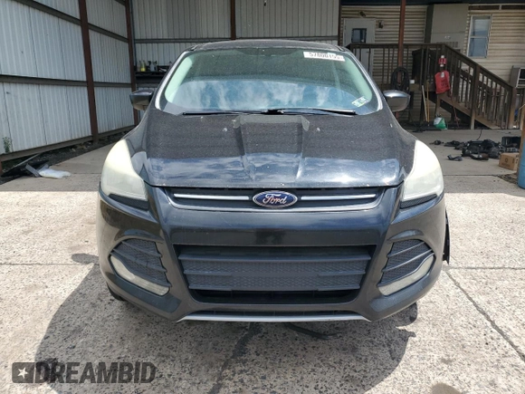 2014 Ford Escape SE z VIN 1FMCU9GX8EUC01956, wystawiony jako Copart lot #57800155 z przebiegiem 174 139 mil mil oraz Czysty tytuł • Clean title. Historia ofert i sprzedaży dostępna na DreamBid. Obrazek 5.