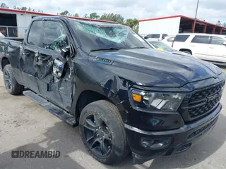 2023 Ram 1500 Big Horn z VIN 1C6RRFBG1PN612321, wystawiony jako IAAI lot #39303273 z przebiegiem 20 647 mil mil oraz . Historia ofert i sprzedaży dostępna na DreamBid. Obrazek 1.