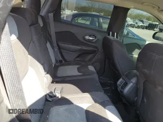 2014 Jeep Cherokee Altitude with VIN 1C4PJMCB0EW230724, listed as a Copart auction lot 49576945 with 133,392 mi miles and Salvage Title. Bid and sale history available at carsss.com. Image 11.