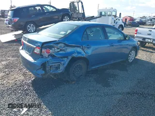 2013 Toyota Corolla L with VIN 5YFBU4EE2DP127014, listed as a IAAI auction lot 41729189 with 156,673 mi miles. Bid and sale history available at carsss.com. Image 4.