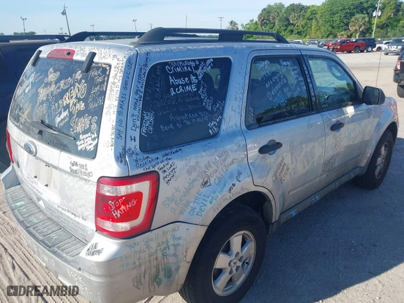 2010 Ford Escape XLT with VIN 1FMCU0D7XAKD16869, listed as a IAAI auction lot 41884141 with 145,781 mi miles. Bid and sale history available at carsss.com. Image 12.