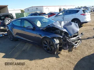 2023 Tesla Model S with VIN 5YJSA1E5XPF500341, listed as a IAAI auction lot 40756406 with 11,583 mi miles and . Bid and sale history available at DreamBid. Image 1.