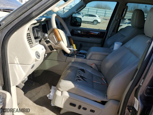 2011 Lincoln Navigator with VIN 5LMJJ2H50BEJ09778, listed as a Copart auction lot 89318695 with 128,392 mi miles and Salvage Title. Bid and sale history available at carsss.com. Image 7.