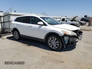 2012 Mazda CX-9 Grand Touring z VIN JM3TB3DVXC0356062, wystawiony jako Copart lot #61493905 z przebiegiem 64 731 mil mil oraz Szkoda całkowita • Salvage title. Historia ofert i sprzedaży dostępna na DreamBid. Obrazek 4.