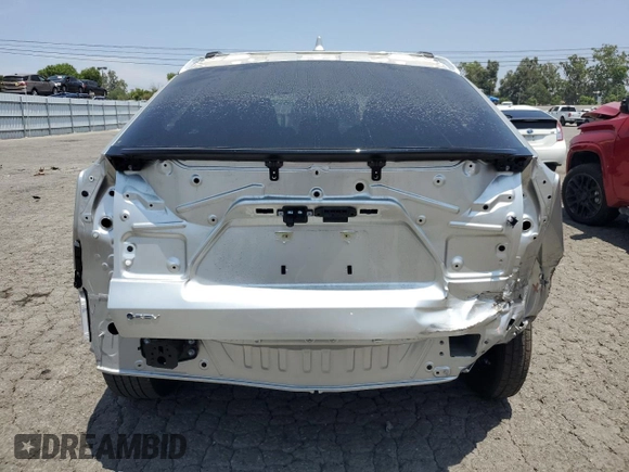 2024 Toyota bZ4X XLE with VIN JTMAAAAA1RA044367, listed as a Copart auction lot 59583075 with 10,890 mi miles and Salvage title. Bid and sale history available at DreamBid. Image 6.