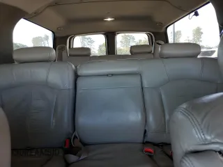 2001 Chevrolet Suburban LT with VIN 3GNFK16T21G209059, listed as a Copart auction lot 70164404 with 339,058 mi miles and Salvage Title. Bid and sale history available at carsss.com. Image 10.