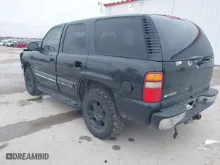 2003 Chevrolet Tahoe LS with VIN 1GNEC13V73R139530, listed as a IAAI auction lot 41598138 with 337,245 mi miles. Bid and sale history available at carsss.com. Image 3.