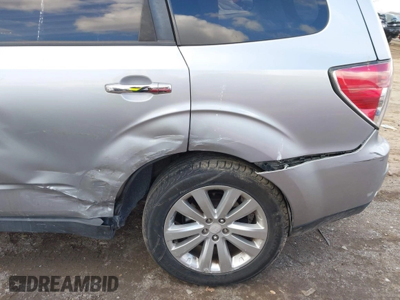 2012 Subaru Forester X Premium with VIN JF2SHADC2CH417588, listed as a IAAI auction lot 41411859 with 114,053 mi miles and . Bid and sale history available at DreamBid. Image 6.