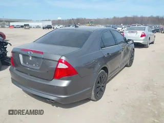 2011 Ford Fusion SE with VIN 3FAHP0HA5BR183979, listed as a IAAI auction lot 42066401 with 205,154 mi miles. Bid and sale history available at carsss.com. Image 4.