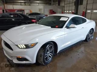 2016 Ford Mustang EcoBoost z VIN 1FA6P8TH9G5232220, wystawiony jako IAAI lot #42175822 z przebiegiem 181 414 mil mil oraz . Historia ofert i sprzedaży dostępna na DreamBid. Obrazek 2.