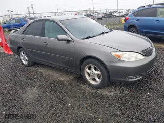 2004 Toyota Camry LE with VIN 4T1BE32K64U898091, listed as a IAAI auction lot 41980395 with 211,233 mi miles. Bid and sale history available at carsss.com. Image 1.