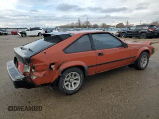 1983 Toyota Supra z VIN JT2MA67L9D0056034, wystawiony jako Copart lot #82382484 z przebiegiem 39 338 mil mil oraz Szkoda całkowita • Salvage title. Historia ofert i sprzedaży dostępna na DreamBid. Obrazek 3.