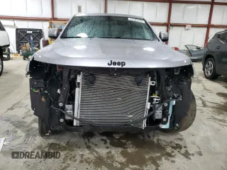 2021 Jeep Grand Cherokee Laredo E with VIN 1C4RJFAG3MC775884, listed as a Copart auction lot 52502325 with 59,368 mi miles and Salvage title. Bid and sale history available at DreamBid. Image 5.