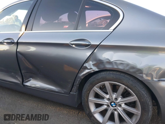 2014 BMW 5 Series 535i with VIN WBA5B1C54ED479873, listed as a IAAI auction lot 41338061 with 75,097 mi miles and . Bid and sale history available at DreamBid. Image 6.