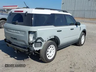 2023 Ford Bronco Sport Heritage z VIN 3FMCR9G61PRD08589, wystawiony jako IAAI lot #40706185 z przebiegiem 150 000 mil mil oraz . Historia ofert i sprzedaży dostępna na DreamBid. Obrazek 4.
