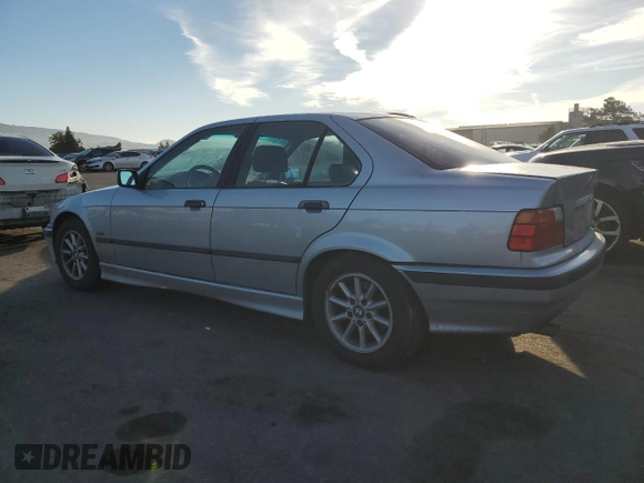 1997 BMW 3 Series 318i with VIN WBACC9328VEE57445, listed as a Copart auction lot 84380934 with 0 mi miles and Salvage Title. Bid and sale history available at carsss.com. Image 2.