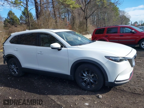 2016 Mazda CX-9 Touring with VIN JM3TCBCY4G0100511, listed as a IAAI auction lot 41811185 with 112,932 mi miles. Bid and sale history available at carsss.com. Image 13.