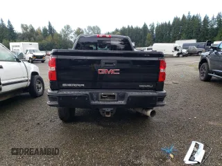 2018 GMC Sierra 3500HD Denali z VIN 1GT42YEY6JF290445, wystawiony jako Copart lot #69260864 z przebiegiem 46 963 mil mil oraz Szkody całkowita. Historia ofert i sprzedaży dostępna na DreamBid. Obrazek 6.