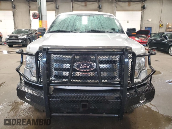 2011 Ford F-150 XLT with VIN 1FTFW1ET3BFC87187, listed as a Copart auction lot 61072695 with 156,365 mi miles and Salvage title. Bid and sale history available at DreamBid. Image 5.