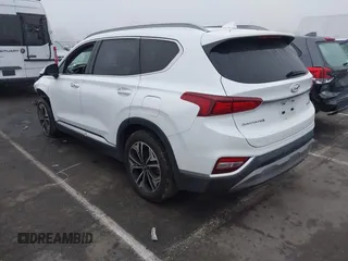 2019 Hyundai Santa Fe Ultimate with VIN 5NMS5CAA3KH036089, listed as a IAAI auction lot 40810710 with 62,561 mi miles and . Bid and sale history available at DreamBid. Image 3.