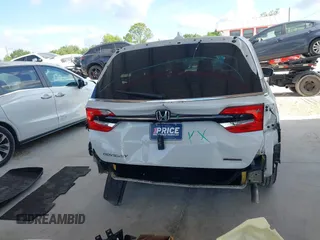 2021 Honda Odyssey Touring z VIN 5FNRL6H80MB003323, wystawiony jako IAAI lot #42303968 z przebiegiem 51 531 mil mil oraz . Historia ofert i sprzedaży dostępna na DreamBid. Obrazek 17.