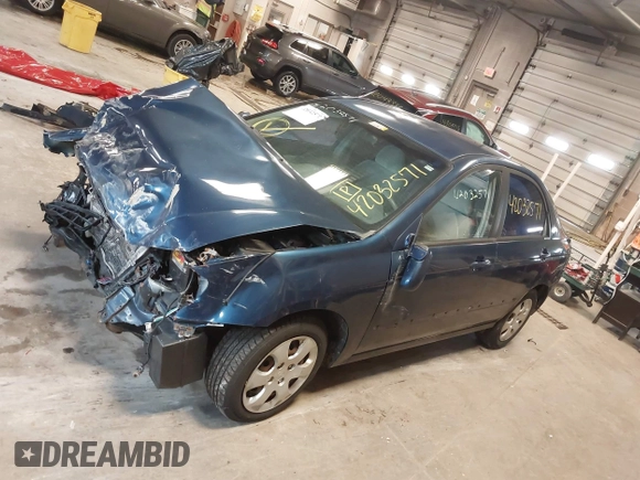 2004 Kia Spectra LX with VIN KNAFE121145012249, listed as a IAAI auction lot 42032571 with 146,748 mi miles. Bid and sale history available at carsss.com. Image 15.