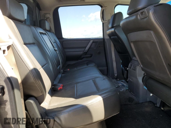 2005 Nissan Titan LE with VIN 1N6BA07B95N571880, listed as a Copart auction lot 57527435 with 199,577 mi miles and Salvage title. Bid and sale history available at DreamBid. Image 10.