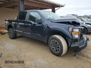 2023 Ford F-150 XL with VIN 1FTEW1EP5PKF67674, listed as a Copart auction lot 50348795 with 23,176 mi miles and Salvage title. Bid and sale history available at DreamBid. Image 4.