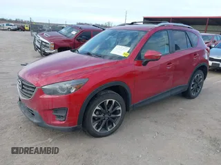 2016 Mazda CX-5 Grand Touring with VIN JM3KE4DY8G0729446, listed as a IAAI auction lot 41871207 with 89,258 mi miles. Bid and sale history available at carsss.com. Image 2.