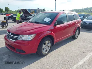 2014 Dodge Journey American Value with VIN 3C4PDCAB2ET221193, listed as a IAAI auction lot 42269264 with 201,257 mi miles and . Bid and sale history available at DreamBid. Image 2.