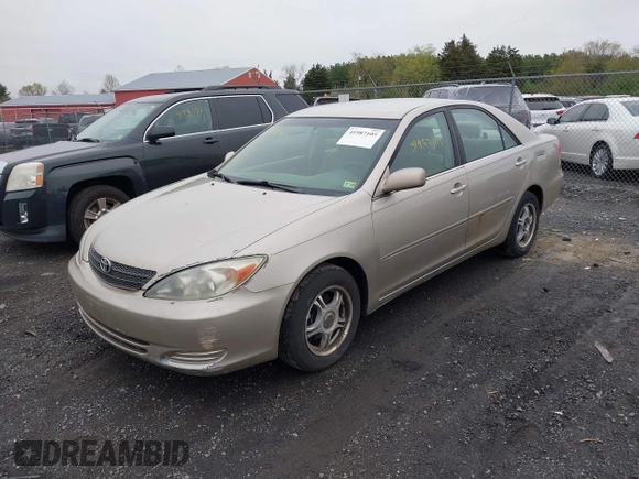 2004 Toyota Camry LE with VIN 4T1BE30KX4U327013, listed as a IAAI auction lot 41987105 with 241,236 mi miles. Bid and sale history available at carsss.com. Image 2.