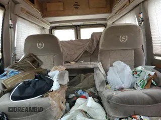 1999 Ford Econoline Cargo with VIN 1FDRE14W5XHB75137, listed as a Copart auction lot 53663605 with 147,149 mi miles and Salvage Title. Bid and sale history available at carsss.com. Image 10.