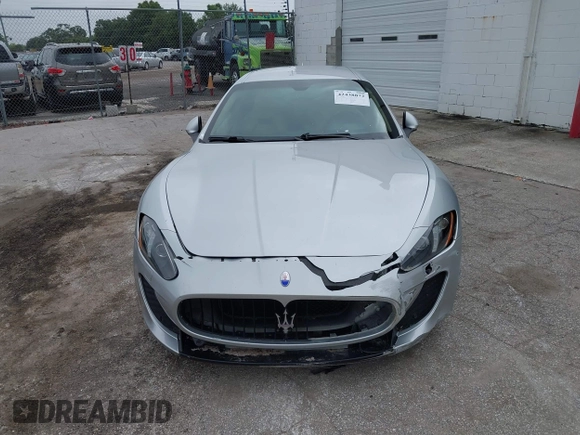 2013 Maserati GranTurismo Sport with VIN ZAM45VLA8D0072490, listed as a IAAI auction lot 42438872 with 84,214 mi miles and . Bid and sale history available at DreamBid. Image 6.