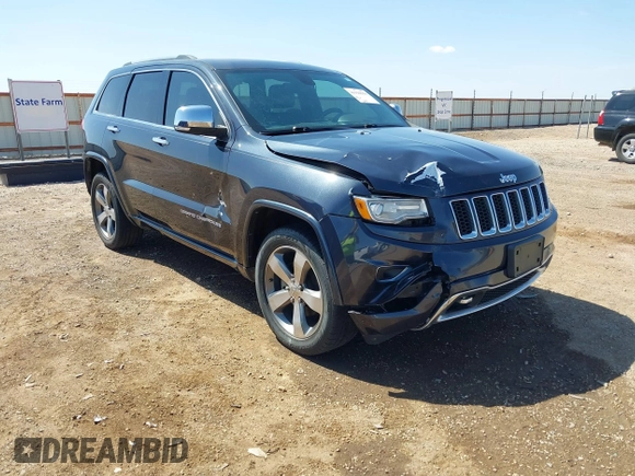 2015 Jeep Grand Cherokee Overland with VIN 1C4RJECG3FC635327, listed as a IAAI auction lot 41910559 with 118,519 mi miles and . Bid and sale history available at DreamBid. Image 1.