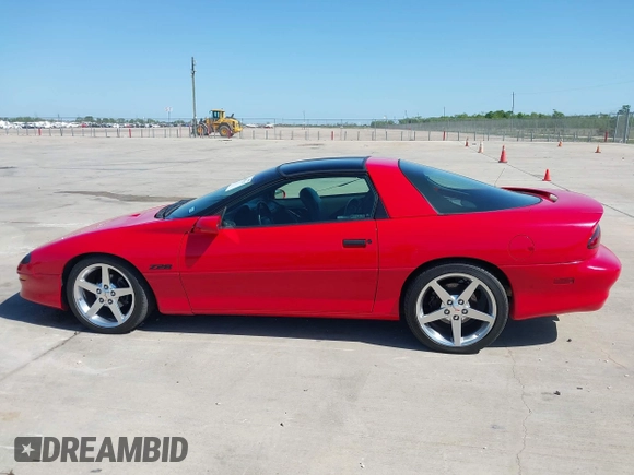 1997 Chevrolet Camaro Z28 z VIN 2G1FP22P1V2150712, wystawiony jako IAAI lot #42007547 z przebiegiem 98 725 mil mil oraz . Historia ofert i sprzedaży dostępna na DreamBid. Obrazek 14.